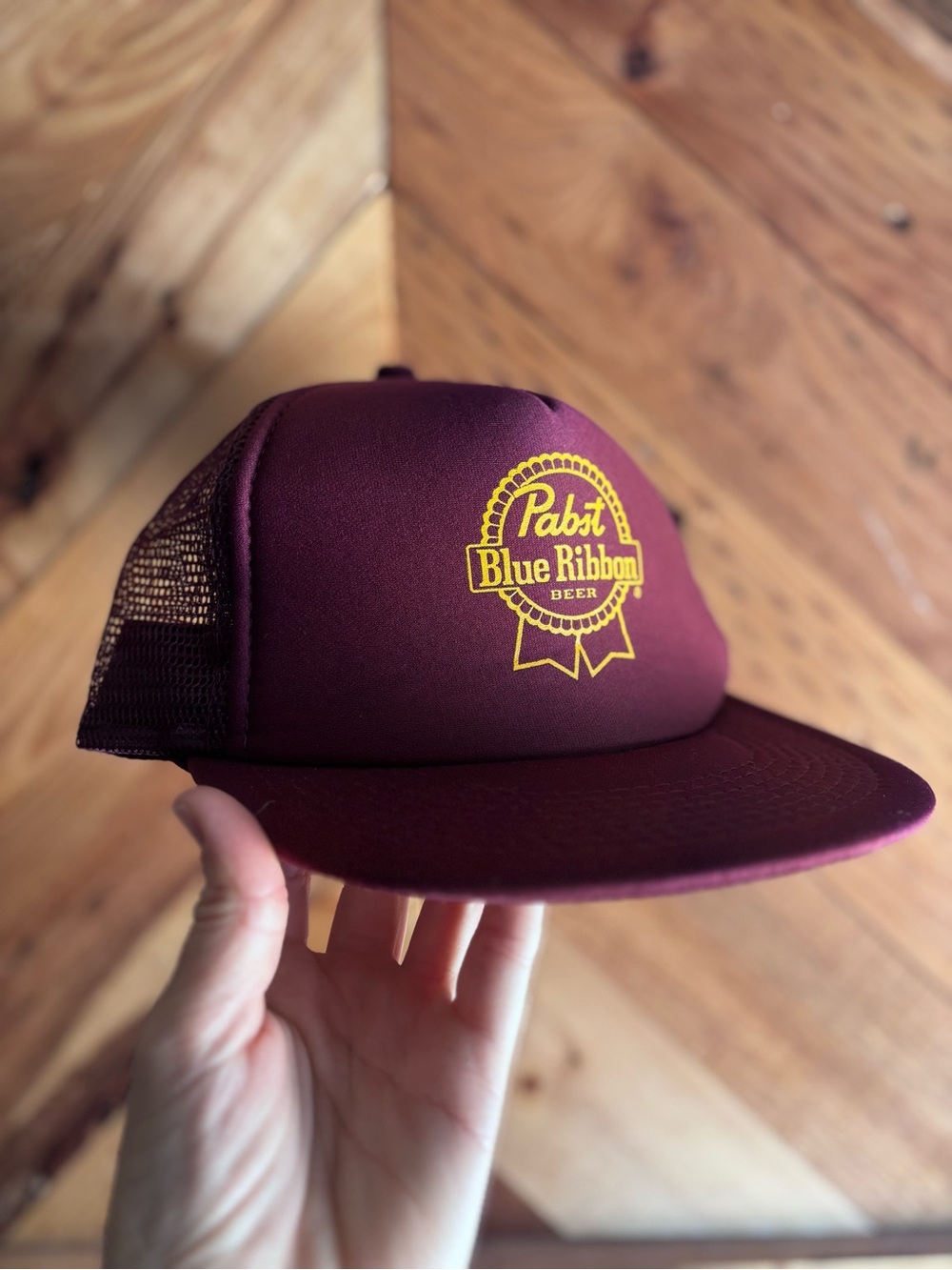 Pabst Blue Ribbon Maroon Trucker Hat with Yellow Logo